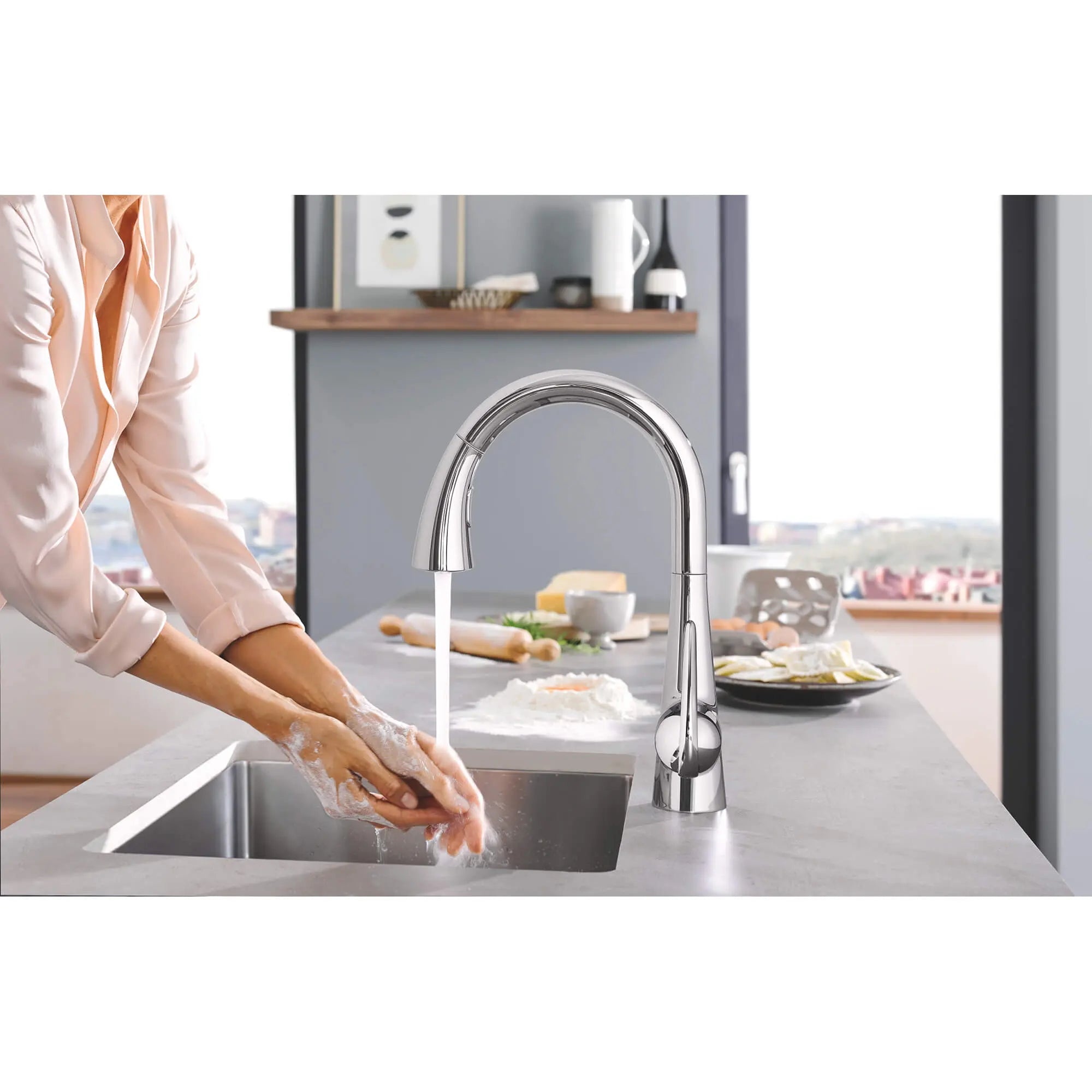 Touchless FootControl Single-Handle Pull Down Kitchen Faucet Dual Spray 1.75 GPM // GROHE STARLIGHT CHROME // 1503_30313000-single-handle-kitchen-faucet-enviro-2_0_CDNwebp.webp