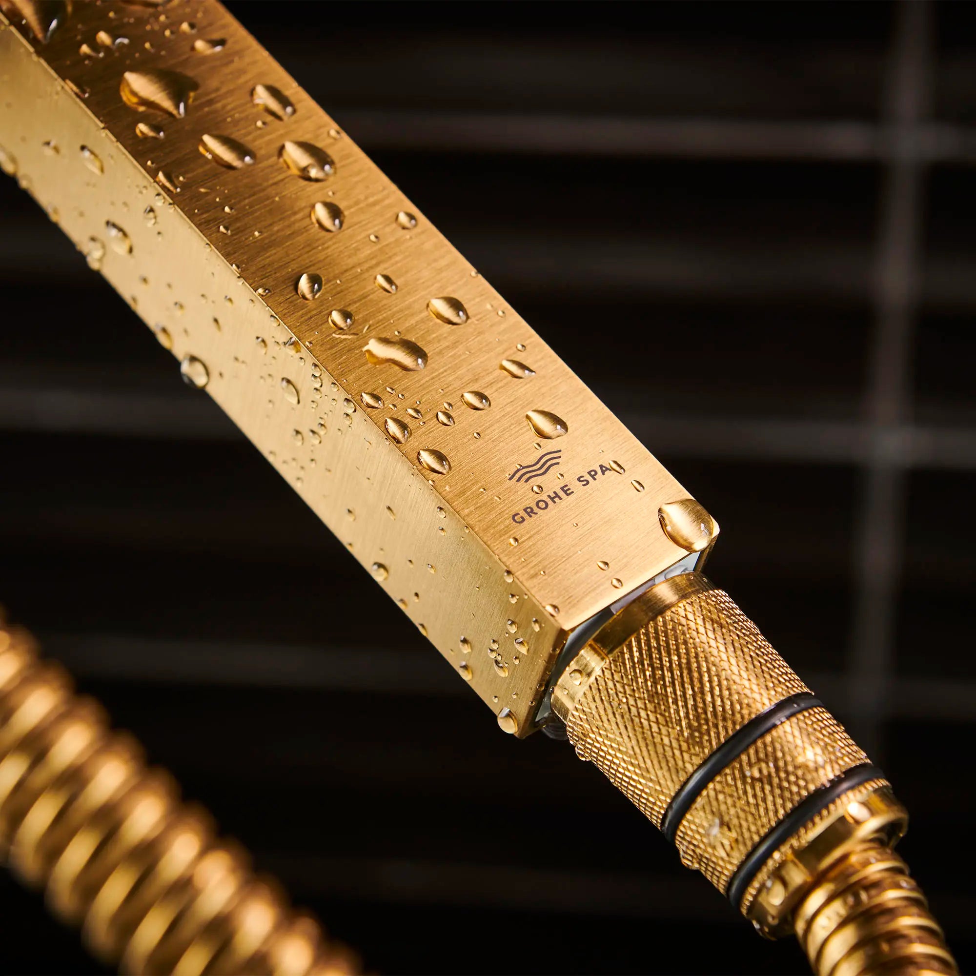 Stick Hand Shower - 1 Spray // BRUSHED COOL SUNRISE // 165881_RainshowerAqua_EnvironmentCloseUp_26867GN0_0001_Aug2023_0_CDNwebp_665098ce-51de-42de-96b7-945a8607ac44.webp