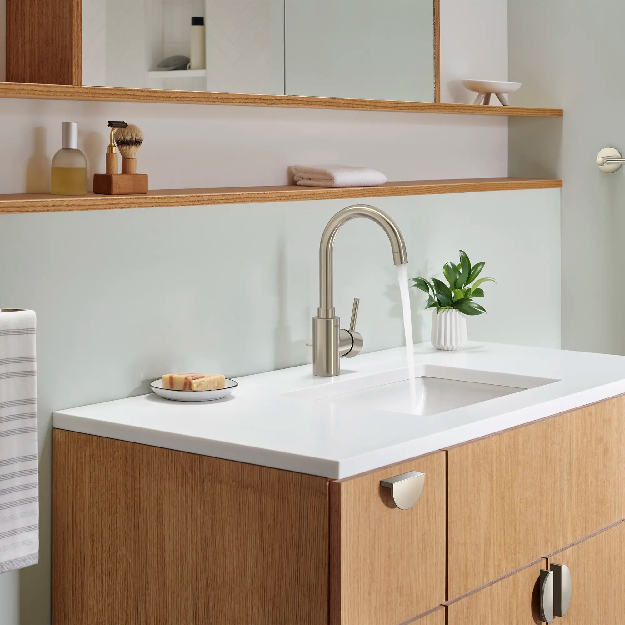 Single Hole Single-Handle L-Size Bathroom Faucet, 1.2 GPM (4.5 L/min) // BRUSHED NICKEL INFINITYFINISH // 236969_Concetto_EnvironmentCloseup_32138EN2_0001_Nov2023_CDNwebp.webp