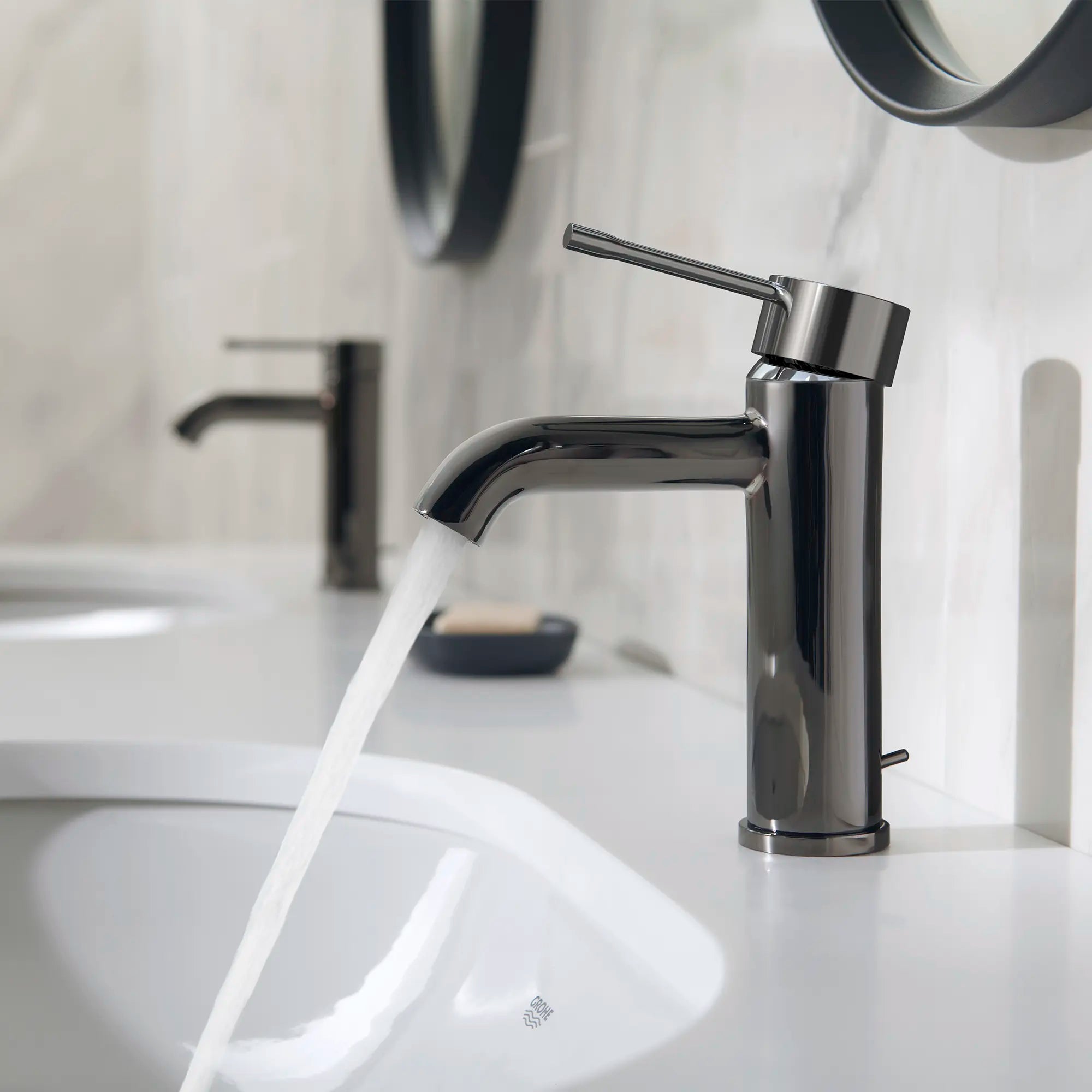Single Hole Single-Handle S-Size Bathroom Faucet, 1.2 GPM (4.5 L/min) // HARD GRAPHITE // 236991_Essence_EnvironmentCloseup_23592A0A_0001_Nov2023_CDNwebp.webp
