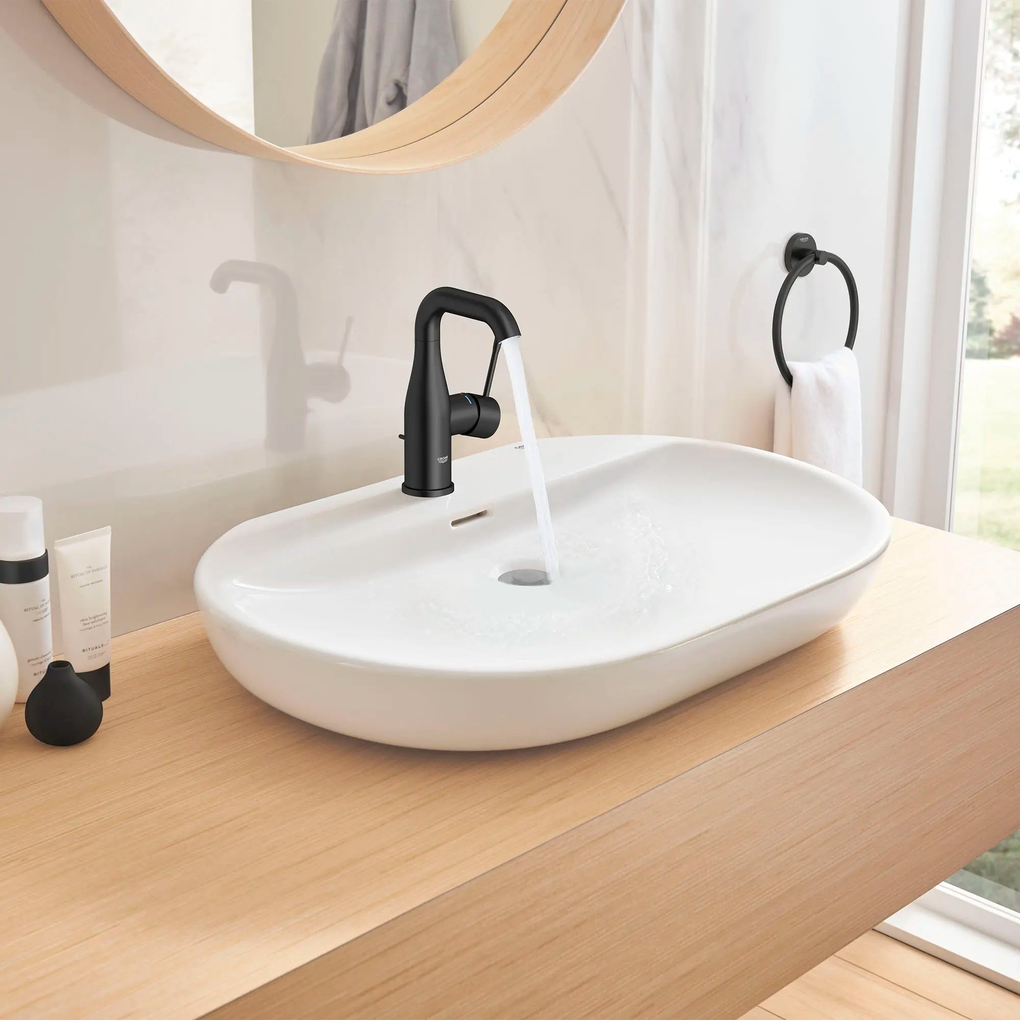 Single Hole Single-Handle M-Size Bathroom Faucet, 1.2 GPM (4.5 L/min) // MATTE BLACK // 237016_Essence_EnvironmentCloseup_234852431_0001_Dec2023_CDNwebp.webp