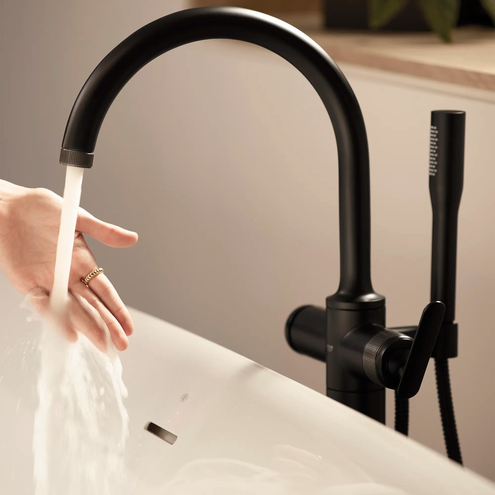 Listra Single-Handle Freestanding Tub Faucet with 1.75 gpm (6.6L/min) Hand Shower // MATTE BLACK // 278836_Listra_EnvironmentCloseUp_1062562430_0002_November2025_0_CDNwebp.webp