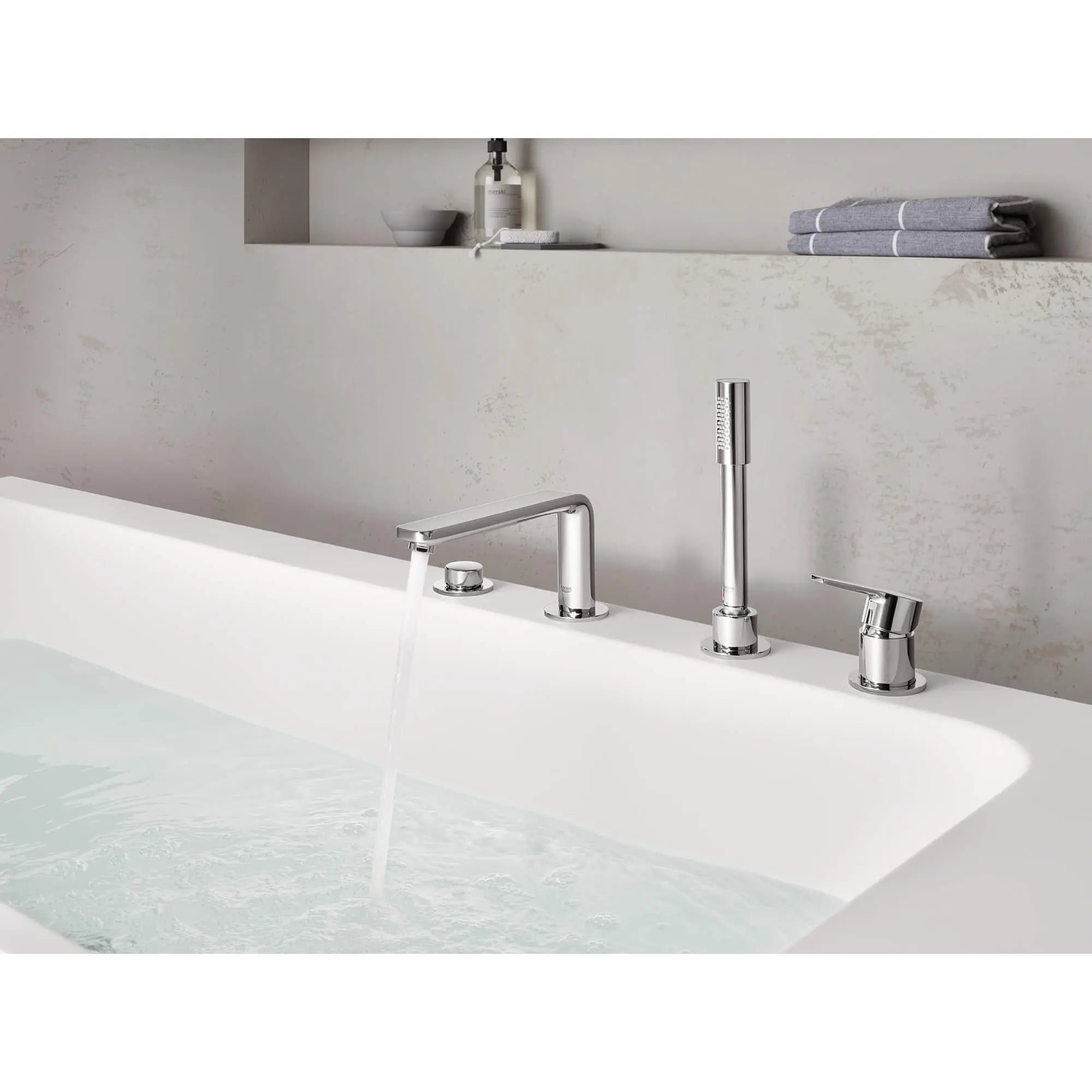 4-Hole Single-Handle Deck Mount Roman Tub Faucet with 1.75 GPM (6.6 L/min) Hand Shower // GROHE STARLIGHT CHROME // 543_19577001-four-hole-bathtub-faucet-with-handshower-enviro-1_0_CDNwebp.webp